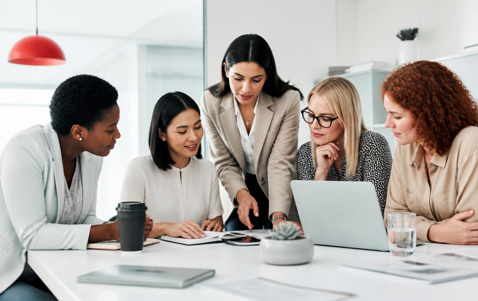 Women professionals collaborating in a modern workplace